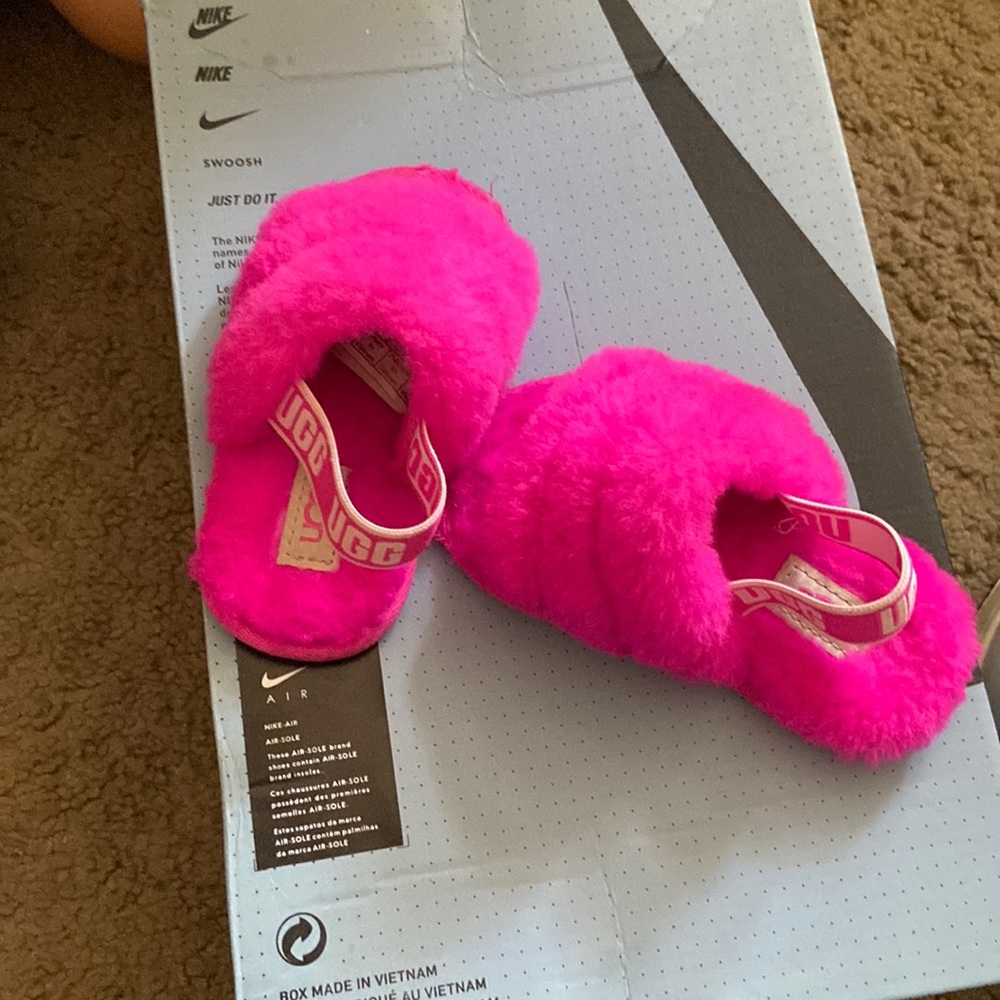 Baby girl ugg slippers.